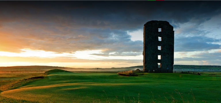 Image displaying the Castle at sunset over Castle Golf Course at Lahinch Golf Club, County Clare, Ireland
