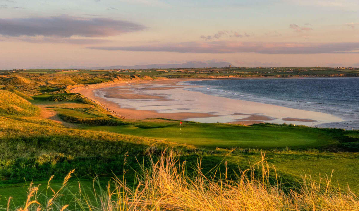 Wide image depicting the 10th and 11th holes and nearby beach at Ballybunion, County Kerry, Ireland