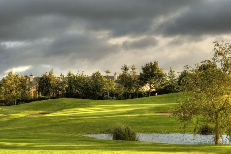 Image of the 3rd hole and building's roof at Wolseley Resort, County Carlow, Ireland, Europe