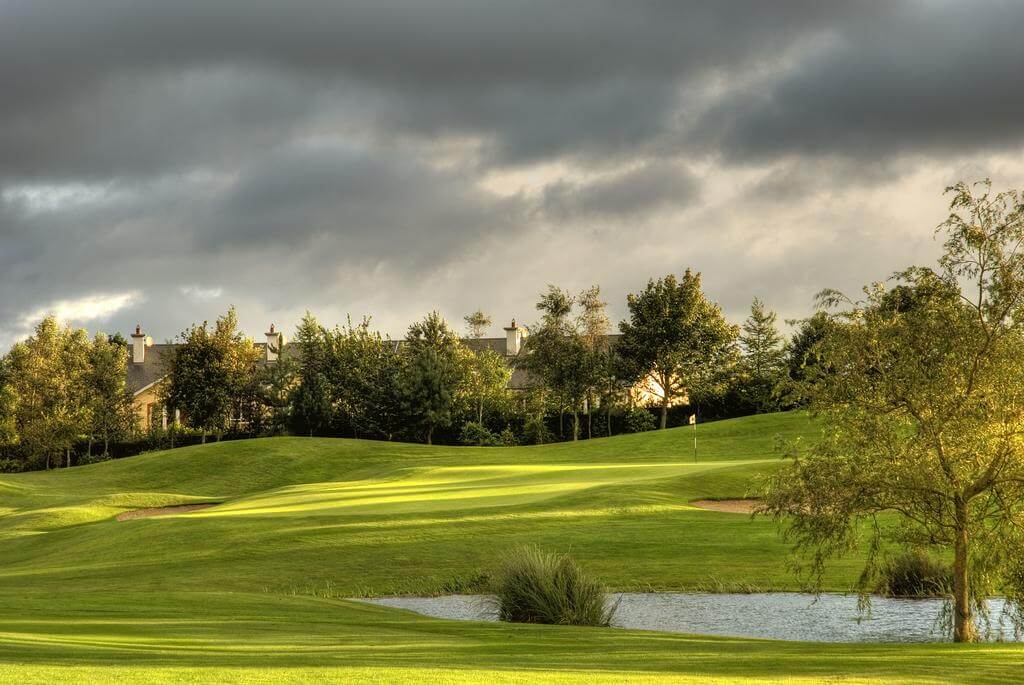 Image of the 3rd hole and building's roof at Wolseley Resort, County Carlow, Ireland, Europe