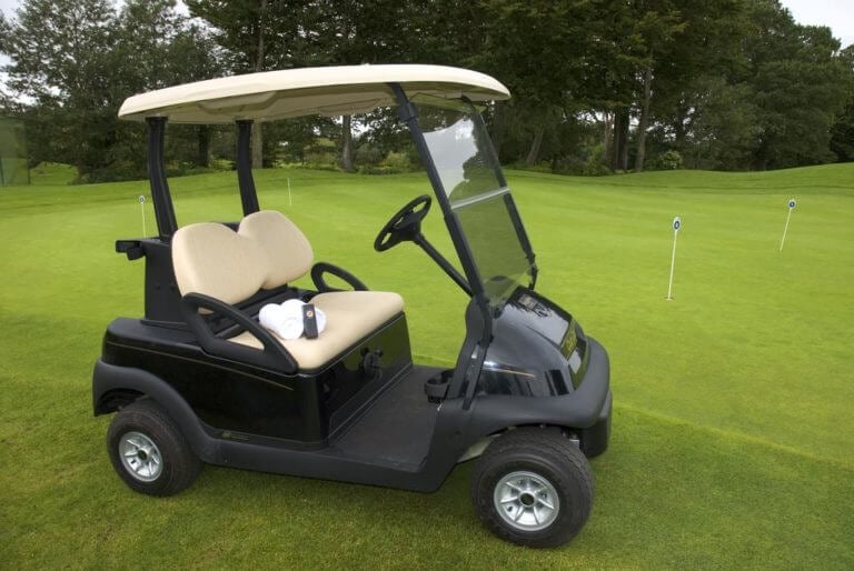 Image of a golf cart on the practice putting green at Wolseley Resort, County Carlow, Ireland, Europe