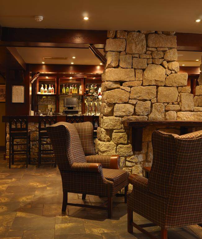 Image depicting a stone fireplace and bar at the Mount Wolseley Resort, County Carlow, Ireland, Europe