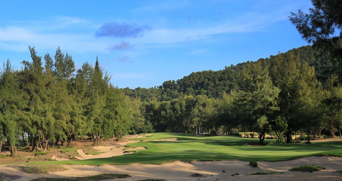 Image looking up the fairway towards the green and right-side bunkers on the 4th hole at Laguna Lang Co Golf Club, Da Nang, Vietnam