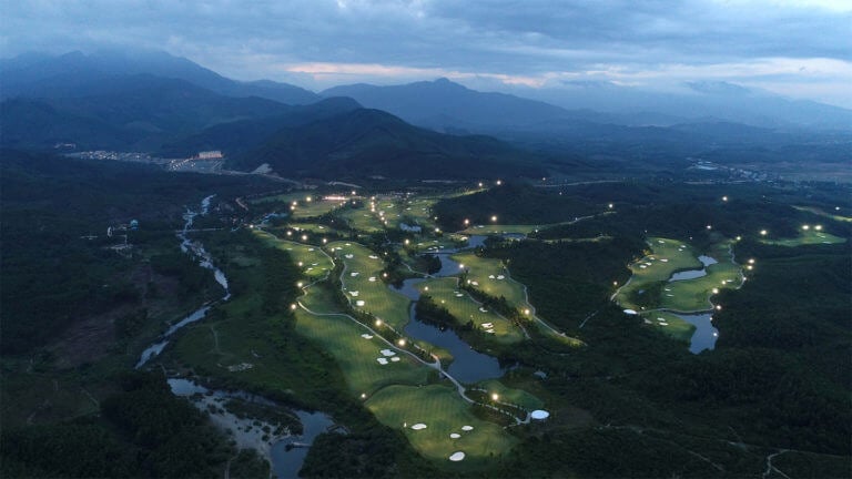 Aerial image at night time displaying the Ba Na Hills Golf Club, Da Nang, Vietnam