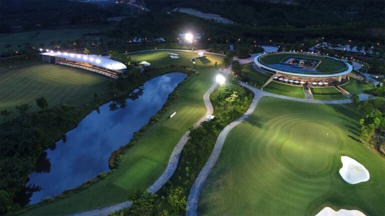 Image of the driving range, clubhouse and practice facilities at night time, Ba Na Hills Golf Club, Da Nang, Vietnam