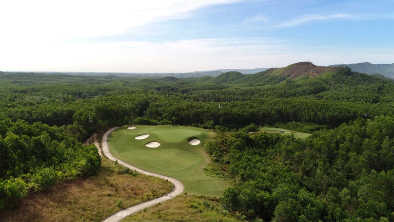 Aerial image from above the 12th tee and looking down at the green and surrounding vegetation, Ba Na Hills Golf Club, Da Nang, Vietnam