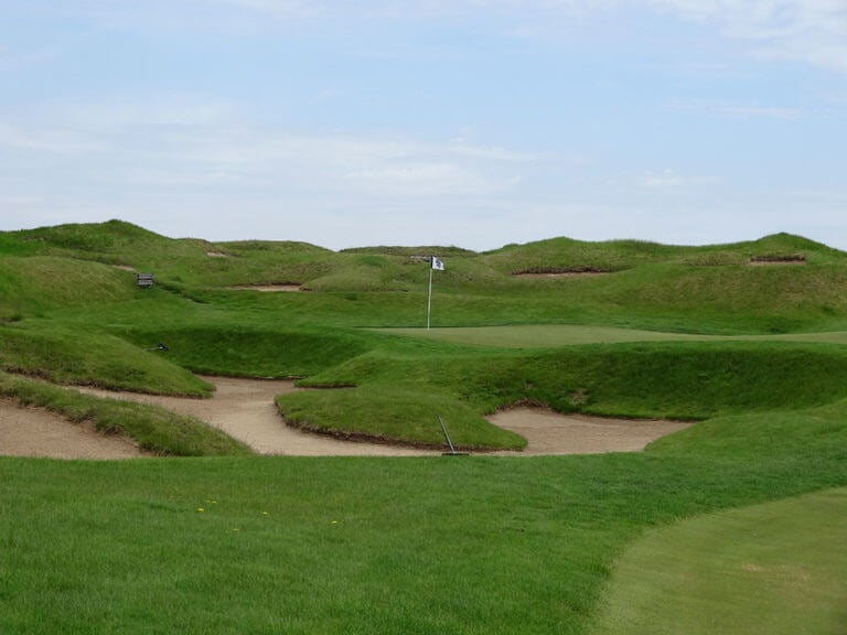 Image of a raised green with bunkers protecting the front and behind on the The Irish Golf Course, Whistling Straits, Destination Kohler, Sheboygan, Wisconsin, USA