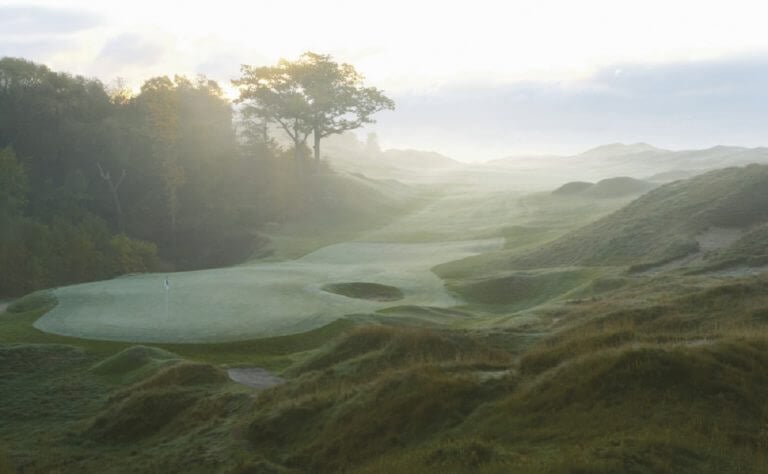 Image of the 9th green shrouded in mist on The Straits Golf Course at Whistling Straits, Destination Kohler, Sheboygan, Wisconsin, USA