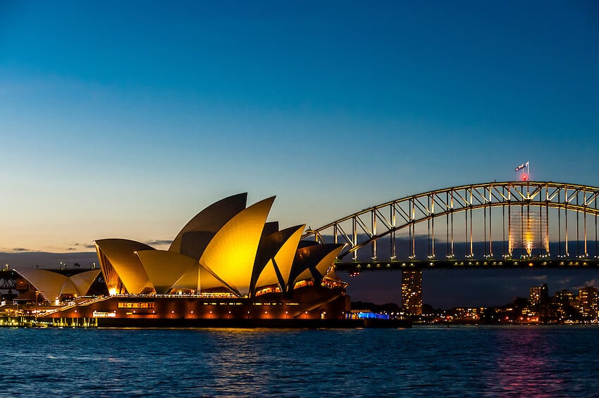 Twilight view of the Sydney Harbour Bridge in the background and the Opera House in the foreground, Australia