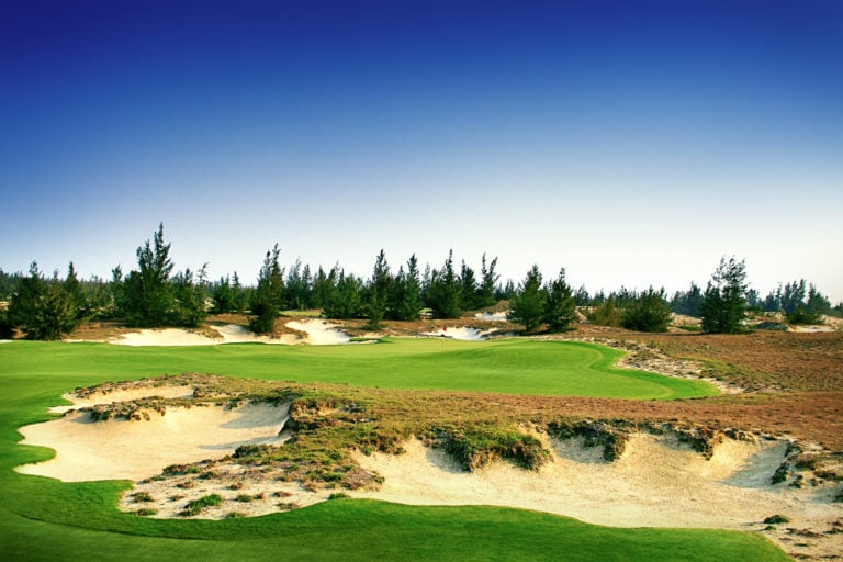 Image depicting the 12th hole with many bunkers on the BRG Golf Course in Danang, Vietnam