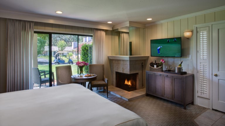 Internal view of a Junior suite with flat screen TV and gas fireplace at Silverado Golf Resort