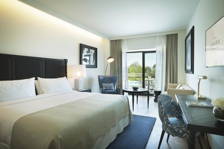 Interior View of a Large King Bed and contemporary living at PGA Catalunya Golf Resort in Spain