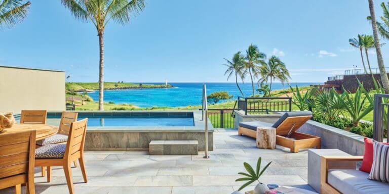The Laola townhouse private plunge pool and patio overlooks the Pacific Ocean and distant lighthouse at Timbers Resort in Hawaii