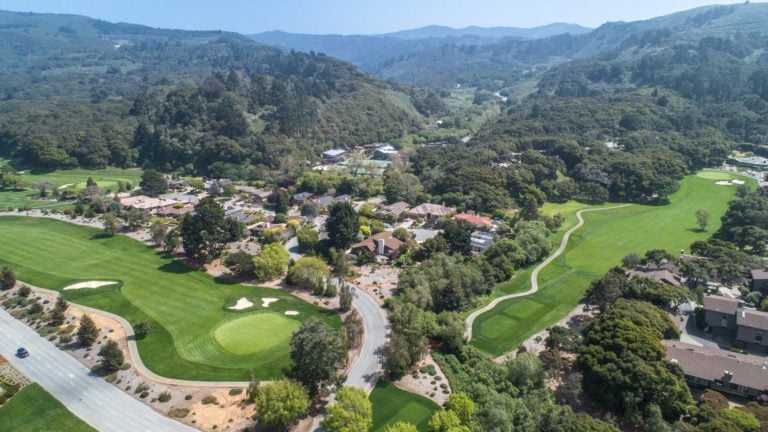 Aerial view of the golf course and main resort buildings at Quail Lodge Resort in California