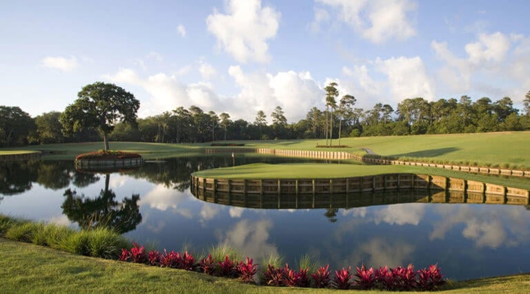 An island green floats in the middle of a lake at TPC Sawgrass Golf Course