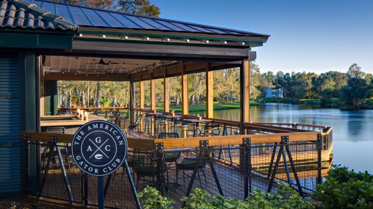 The American Gator Club restaurant overlooks a lake at Sawgrass Marriott Golf Resort & Spa in Florida
