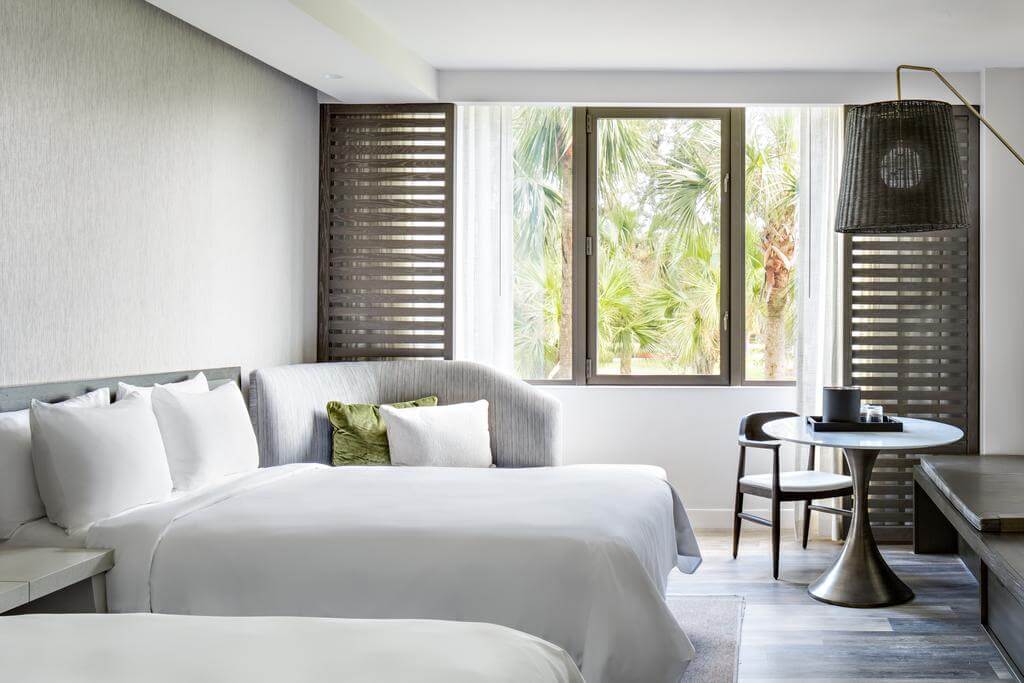Internal view of twin beds and contemporary furniture at Sawgrass Marriott Golf Resort & Spa, Florida