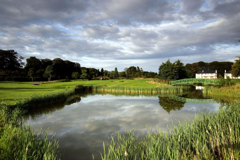 Overlooking a lake adjacent to the sixth hole on the Arnold Palmer Golf Course at The K Club, Ireland