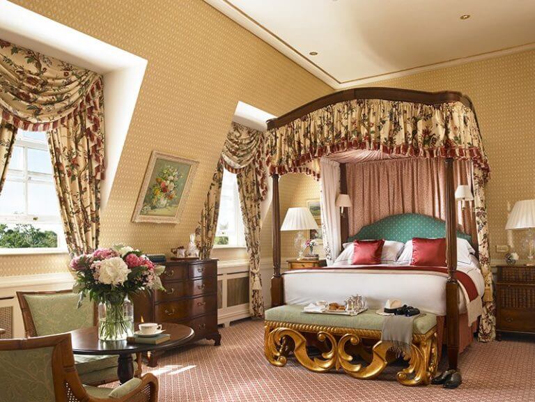 A four-poster bed and Victorian decorations adorn the Presidential Suite at The K Club Resort in Ireland