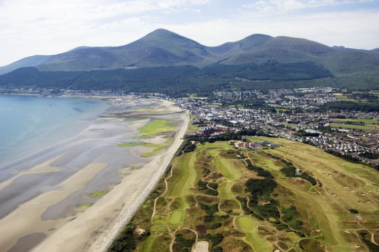 Aerial view of Royal County Down Golf Course and the town of County Down