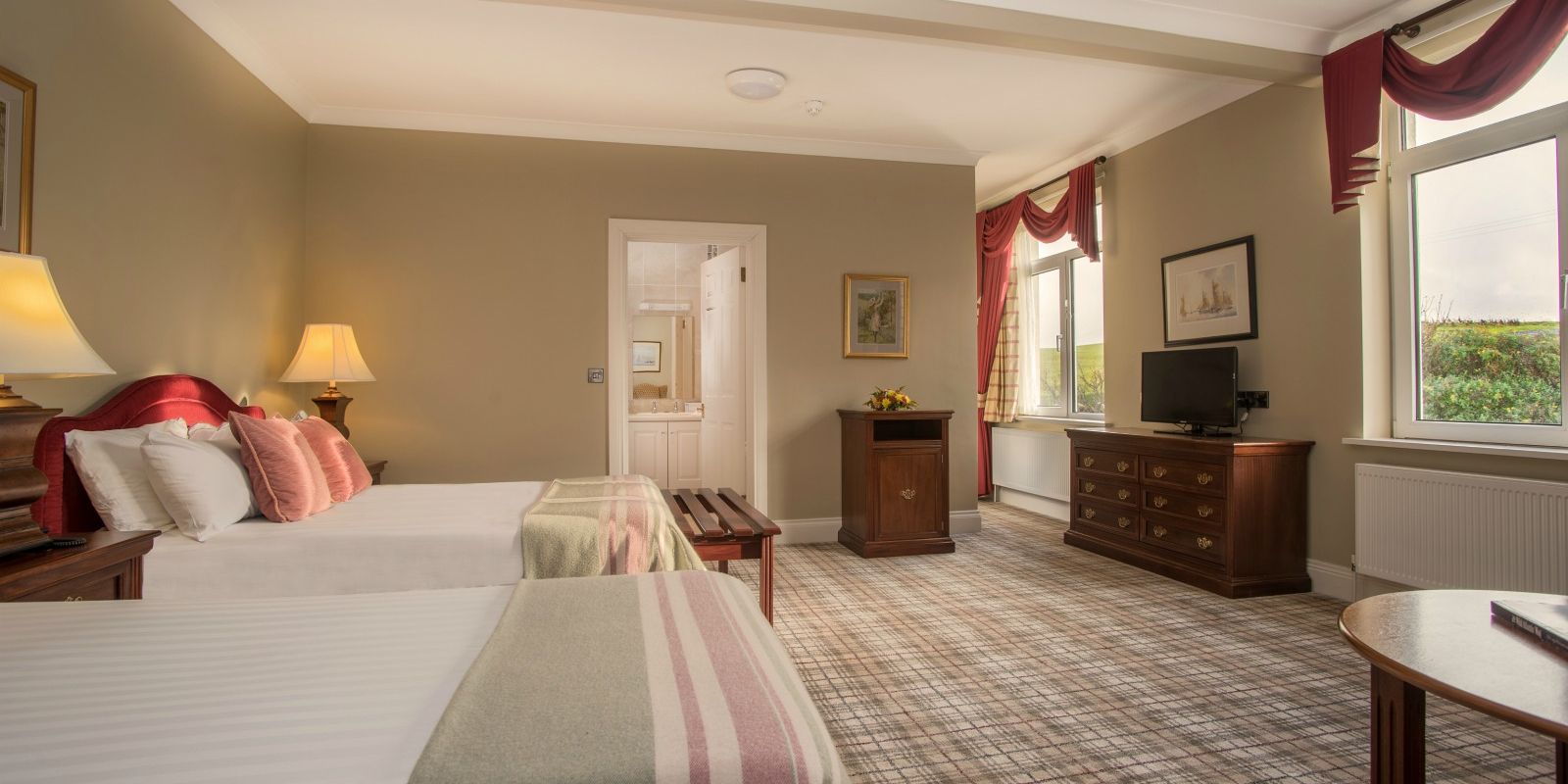 Interior view of a twin double-bed room at Rosapenna Golf Resort, Ireland