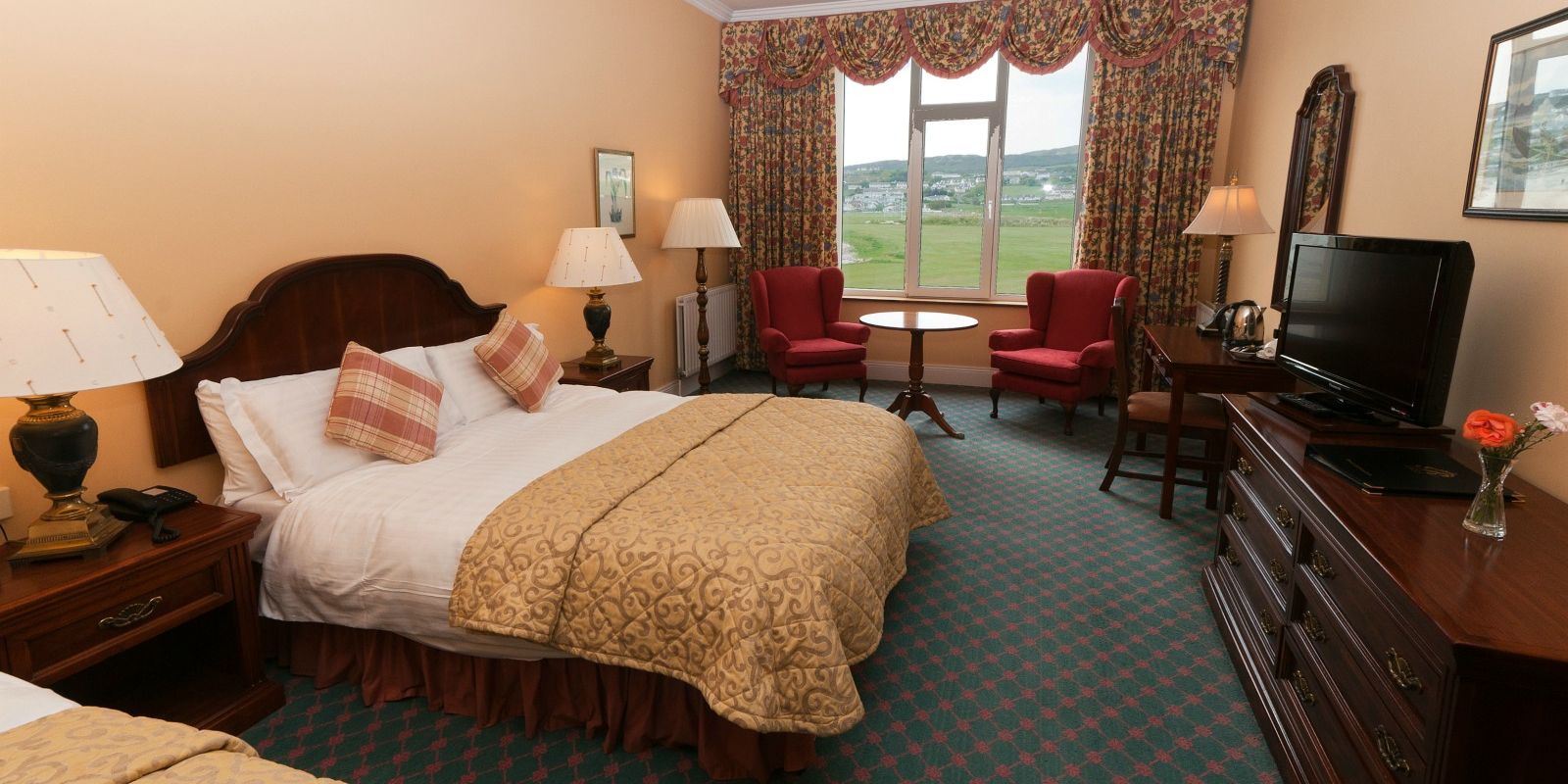 Push bedding and cosy furniture adds comfort to Deluxe Rooms at Rosapenna Golf Resort, Ireland