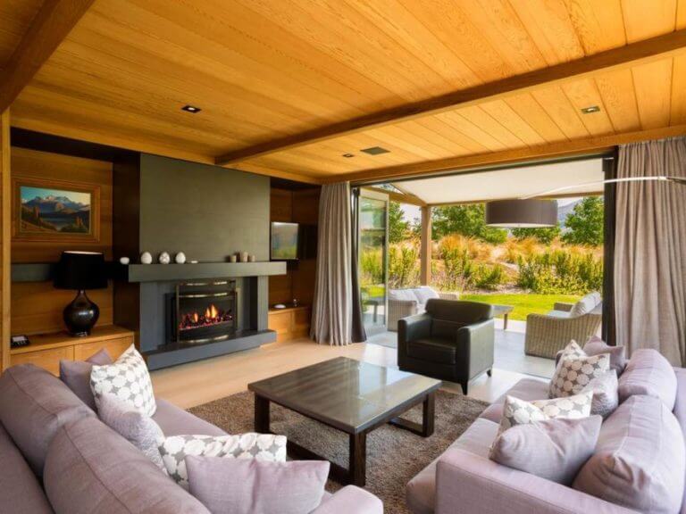 Looking into the lounge room of a rental property at Millbrook Resort New Zealand