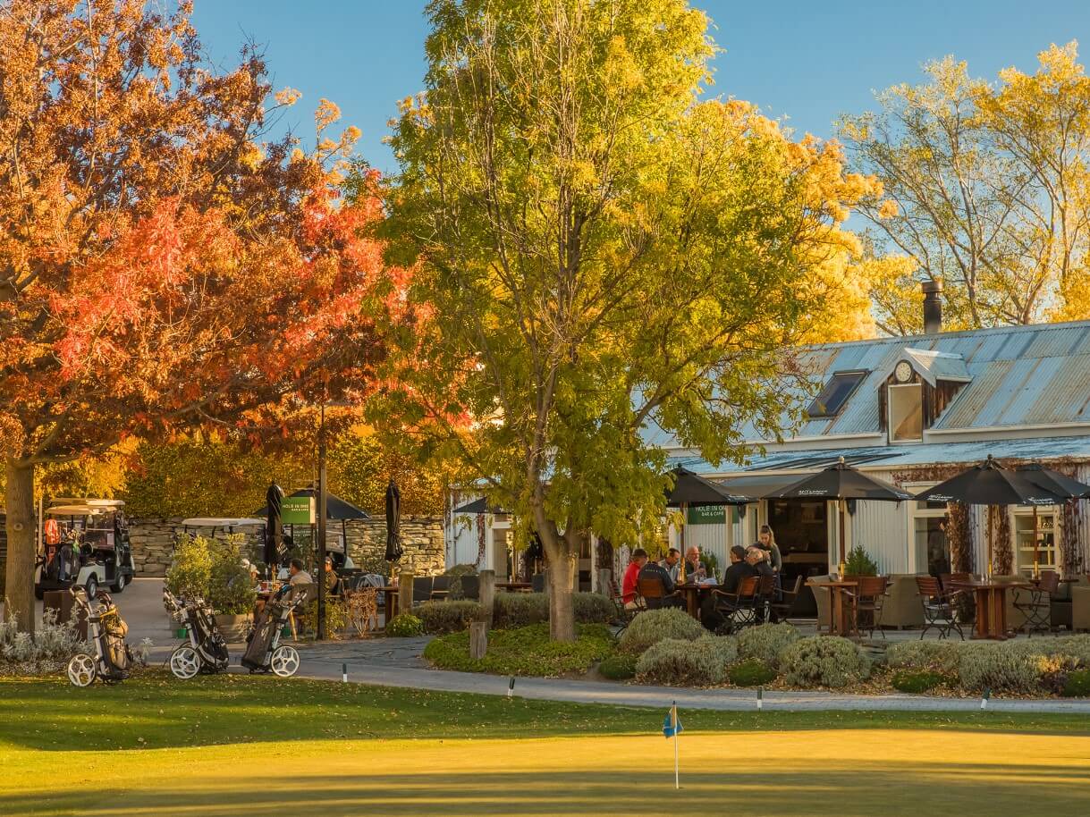Image of travelling golfers eating lunch at the Millbrook Resort Clubhouse, New Zealand