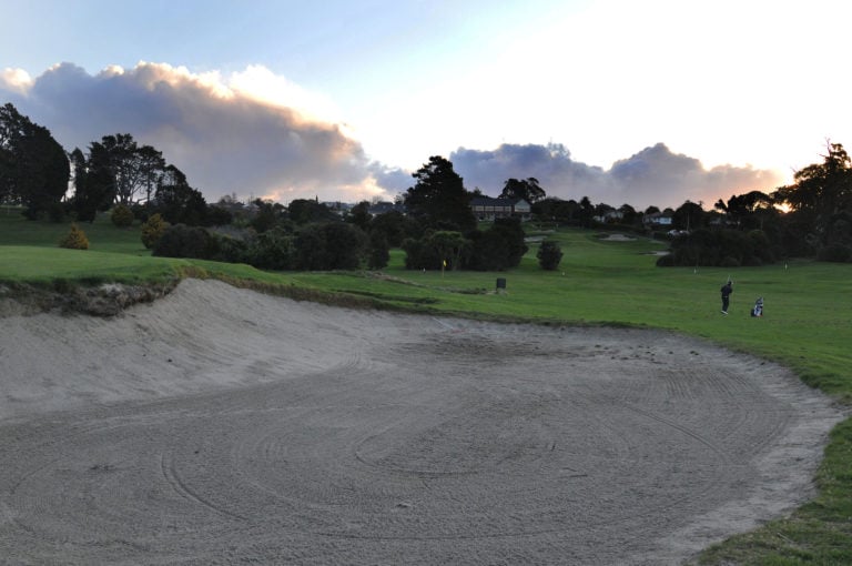 Dusk image of the golf practice facilities at Titirangi Golf Club, New Zealand