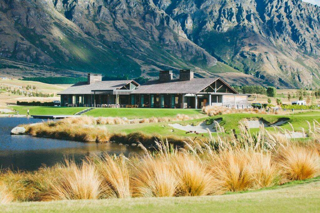 Image displaying the architecturally designed golf clubhouse at Jack's Point, New Zealand