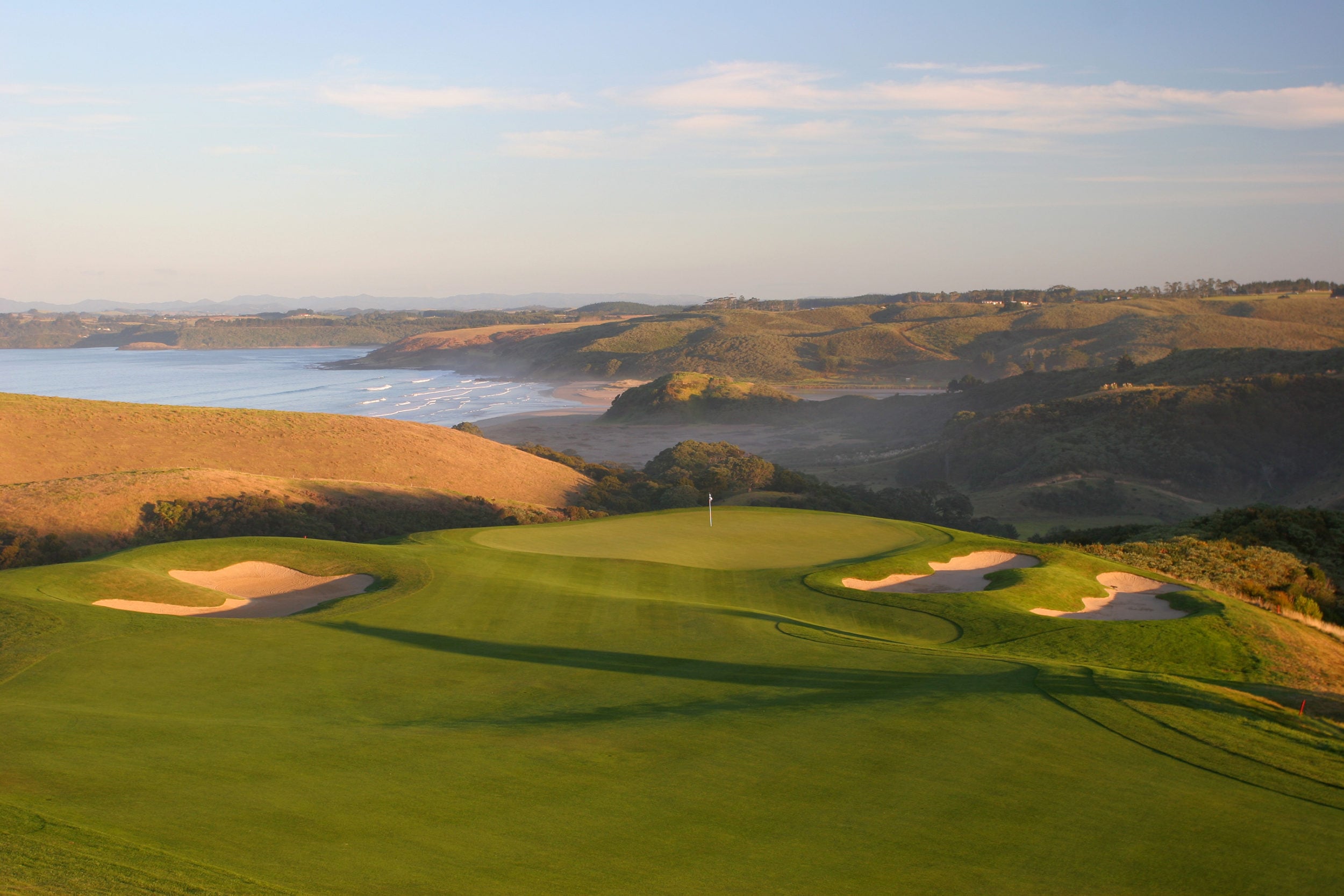 Dusk image overlooking the 4th hole at Kauri Cliffs Golf Course