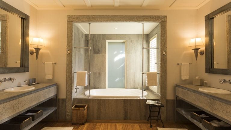 Image of a deluxe suite bathroom at New Zealand's Kauri Cliffs Golf Resort