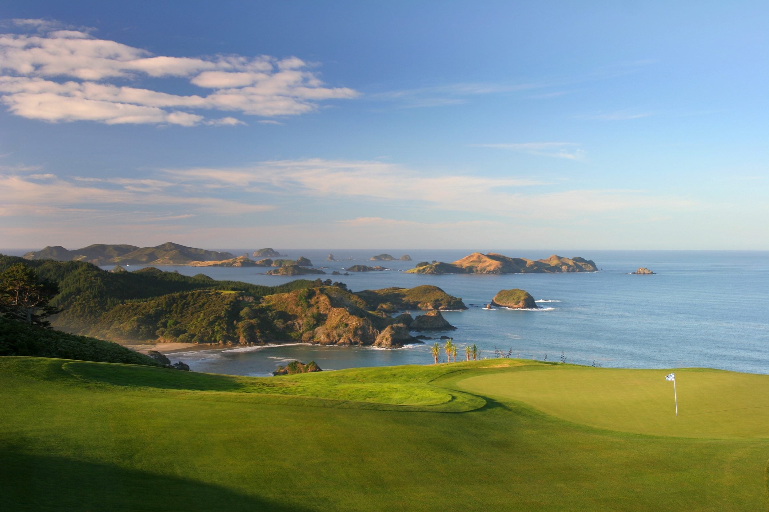 Image overlooking the 16th green on Kauri Cliffs' renowned golf course