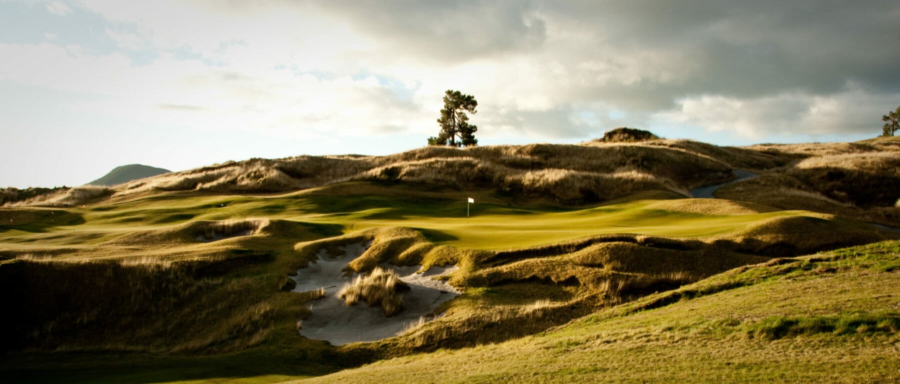 Image depicting a green cut out of a ridge on the Kinloch Club Golf Course