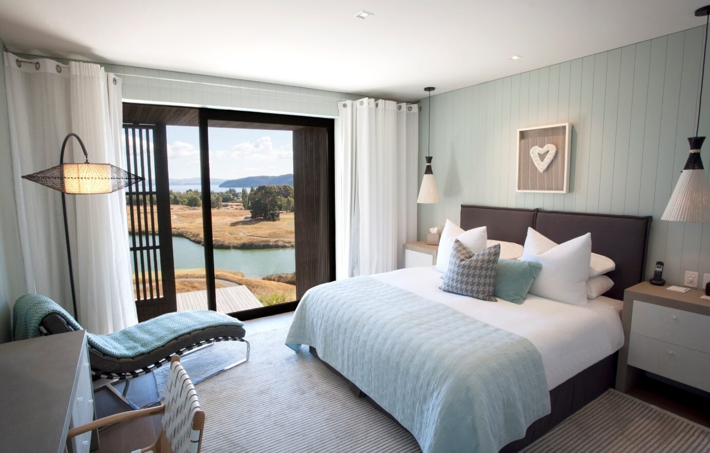 Interior view of a Junior Suite overlooking a lake on The Kinloch Club Golf Course, Taupo