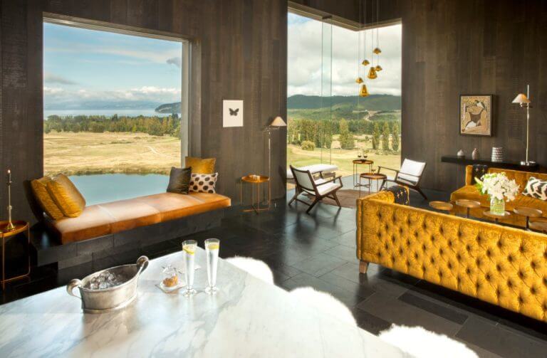 Contemporary furniture compliments expansive country views of Lake Taupo from The Kinloch Club