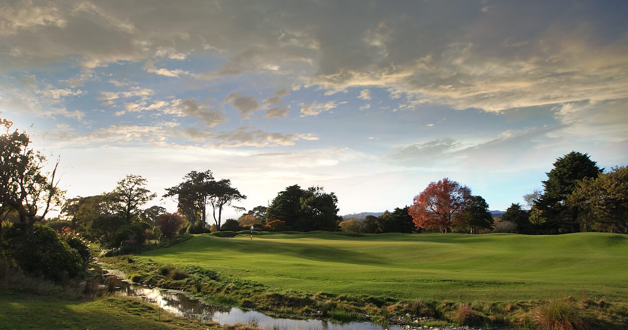 A stream meanders past a raised green on the seventh hole of the Royal Wellington Golf Club
