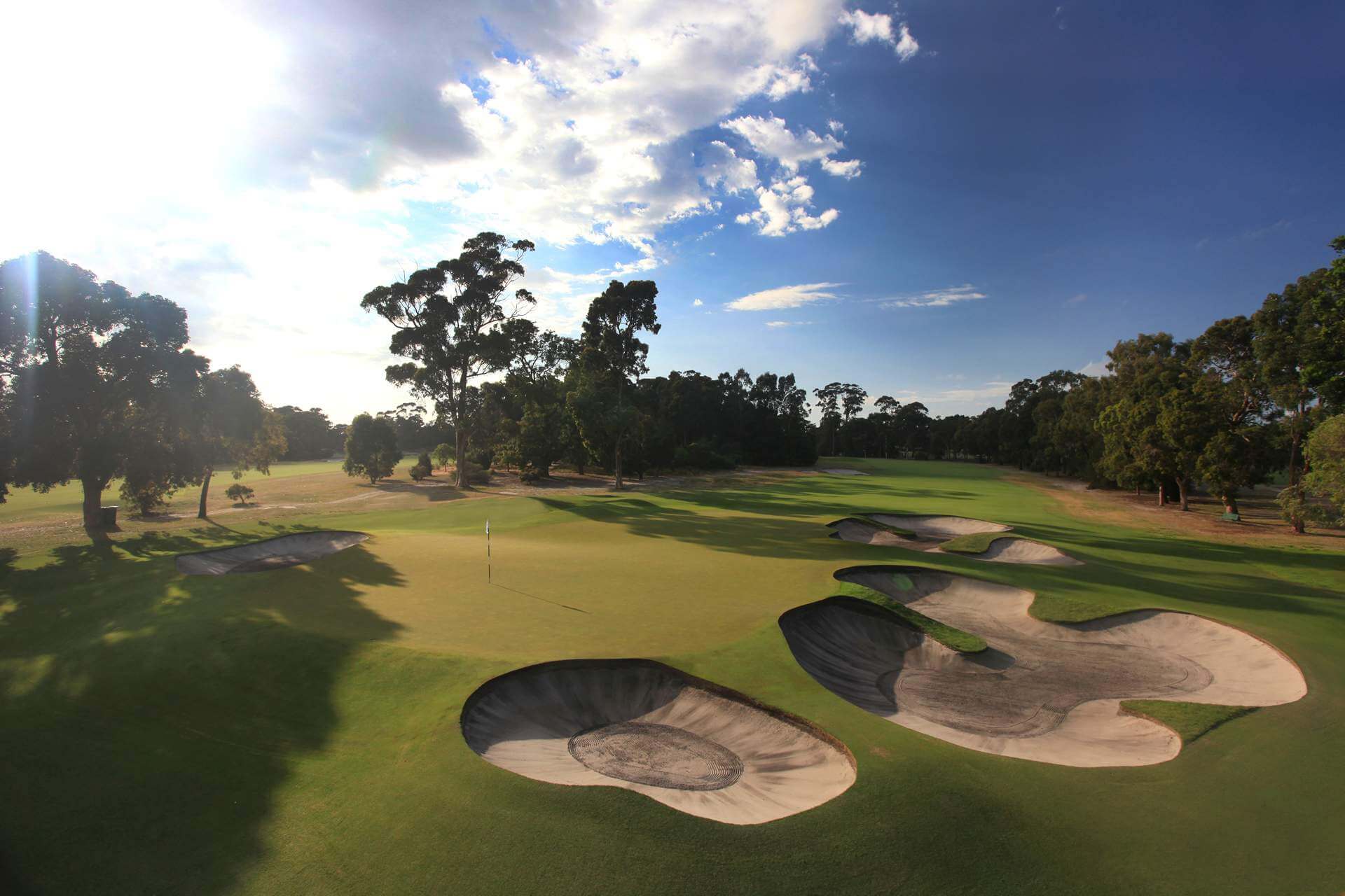 Large sandy bunkers at The Metropolitan Golf Club reveals the Sandbelt golf region below