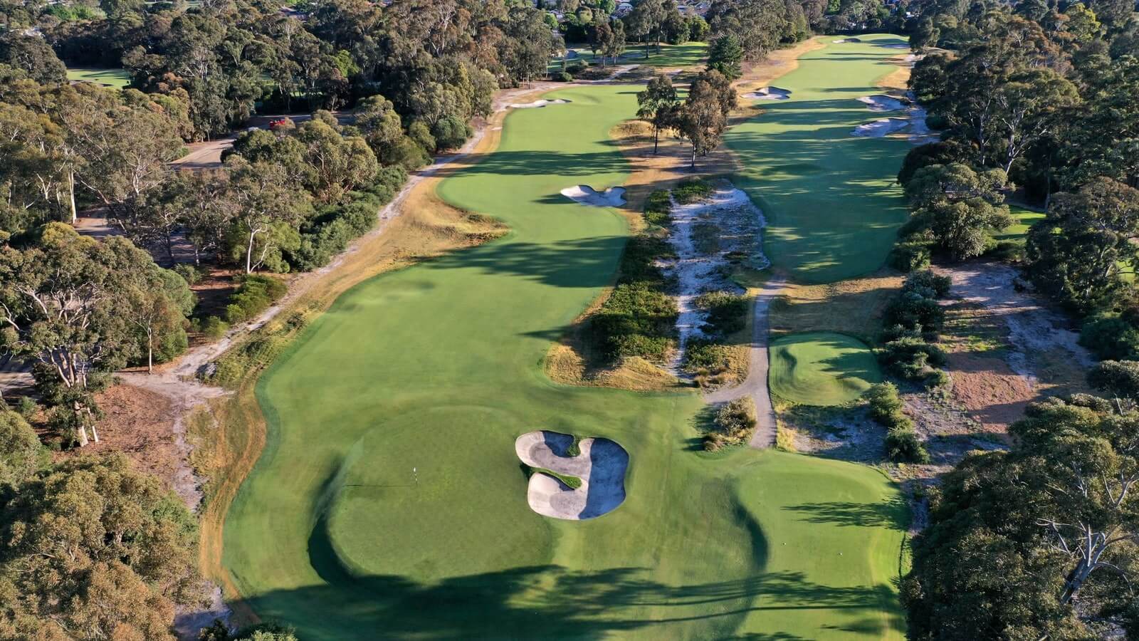 Aerial view of the Sandbelt bunkers and open fairways of the Metropolitan Golf Club