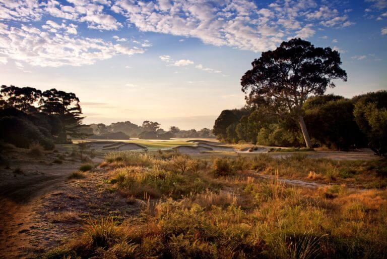 Dusk casts golden light over the course at Kingston Heath Golf Club