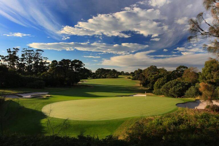 Well-manicured green surrounded by dense Australian bushland