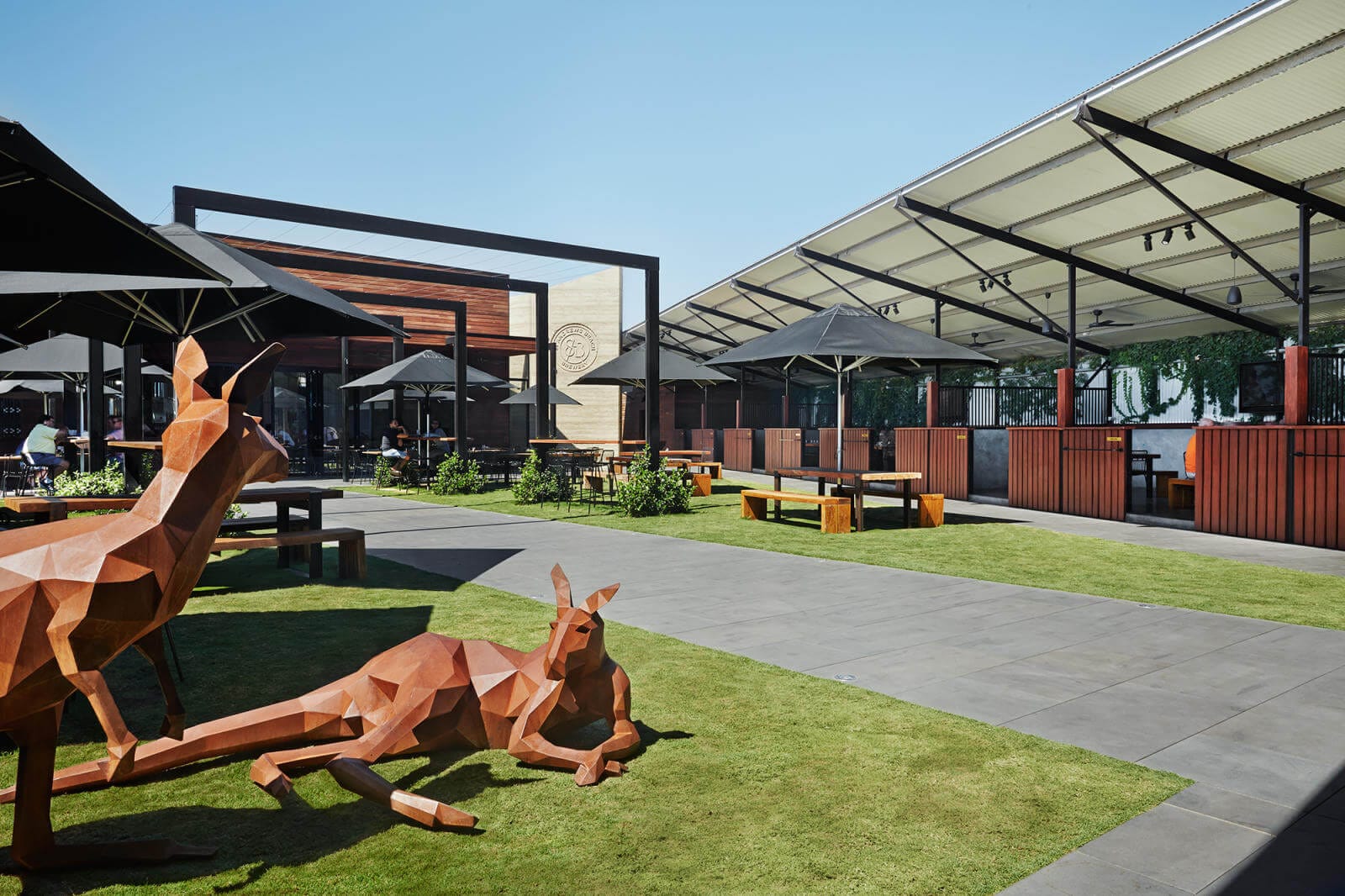 Statues of kangaroos and outdoor seating areas at St Andrews Beach Brewery