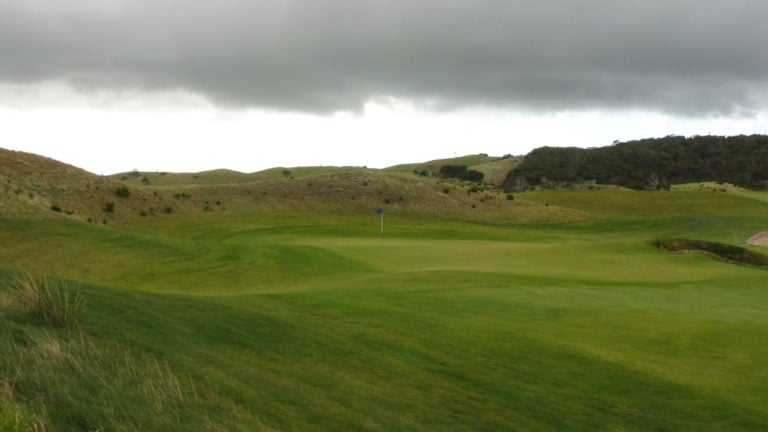 The second green is protected on three sides by a hill and bunker on the other