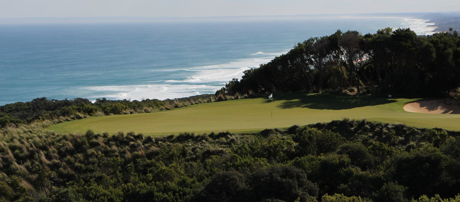 A plateaued green overlooks Bass Strait on The Old Course at The National Golf Club
