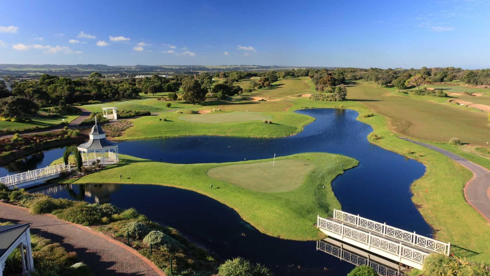 Aerial view of an island green surrounded by lake at Eagle Ridge Golf Club