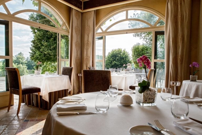 Fine dining at Les Fresques restaurant opens to an outside terrace