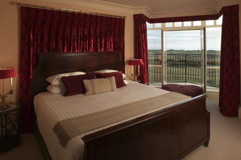 Large bedroom with private balcony overlooking the St Andrews Old Course