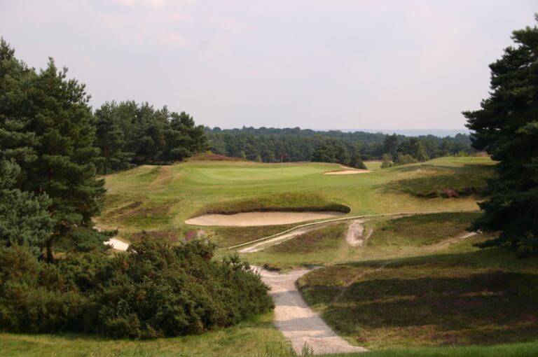 A large ravine and bunker protect a green off the tee at Sunningdale Golf Club's new course