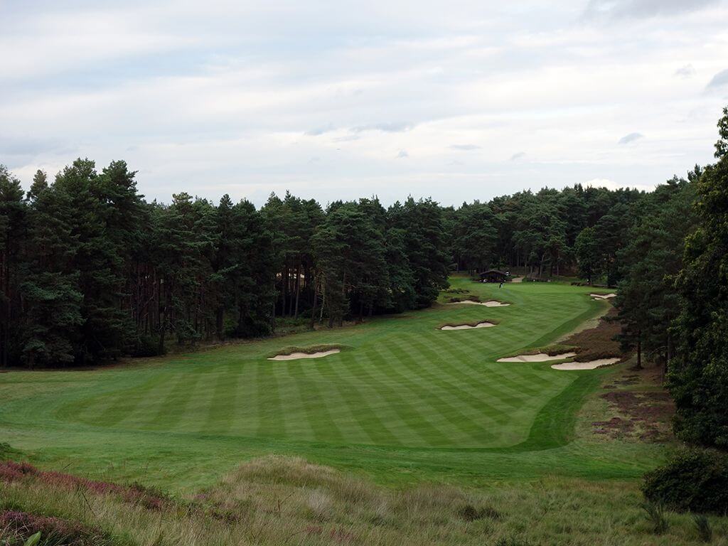 Overlooking the tenth fairway littered with flat-bottomed bunkers