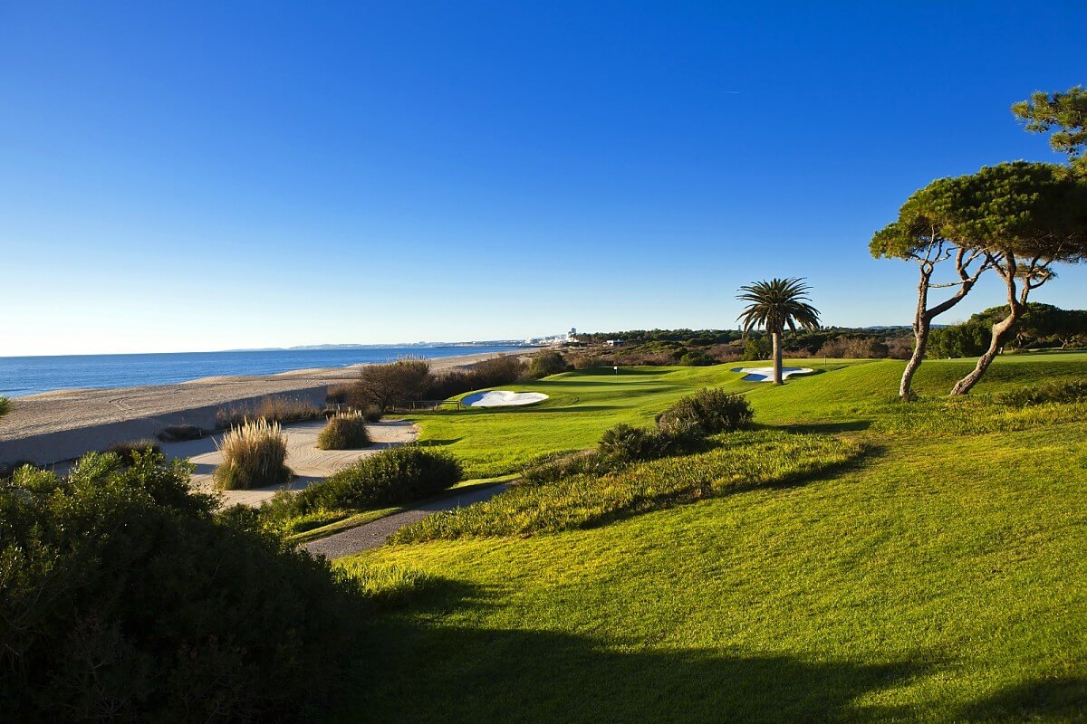 Long shadows contrast with green fairways at Vale do Lobo